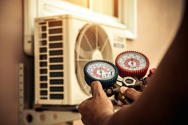 Professional Air Conditioning Service technician working in Beverly Hills, MI